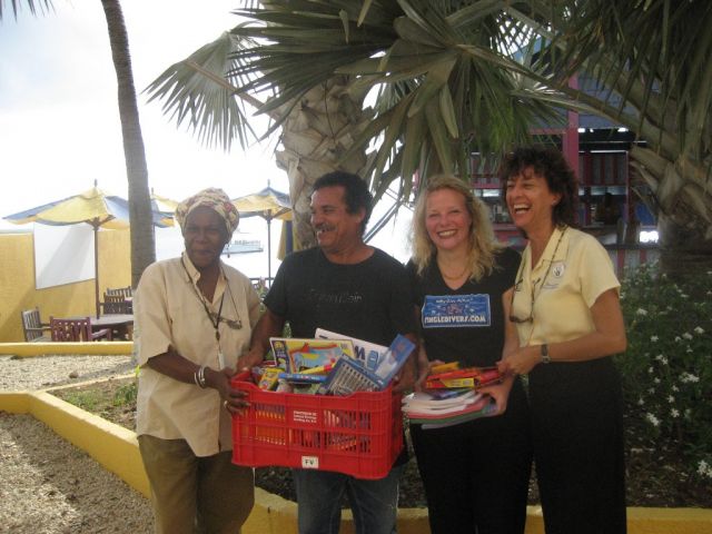 Wench donating the school supplies