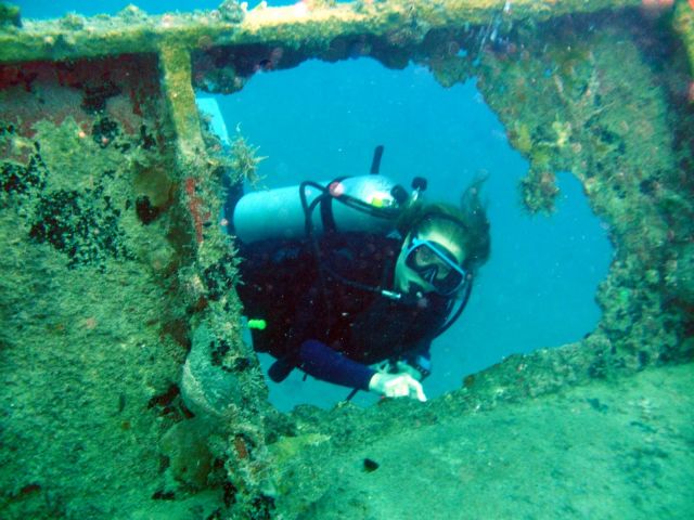 Susi (number 1 best dive buddy) on a wreck.