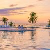 cayman brac pool beach sunset 1060x403 Min