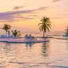 cayman brac pool beach sunset 1060x403 Min