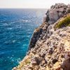 cayman brac rocky cliff water 1060x834 Min