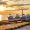 cayman brac four boats docked sunset 1060x834 Min