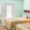 cayman brac double bedroom 1060x403 Min