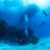 cayman brac divers below water 1060x834 1 1